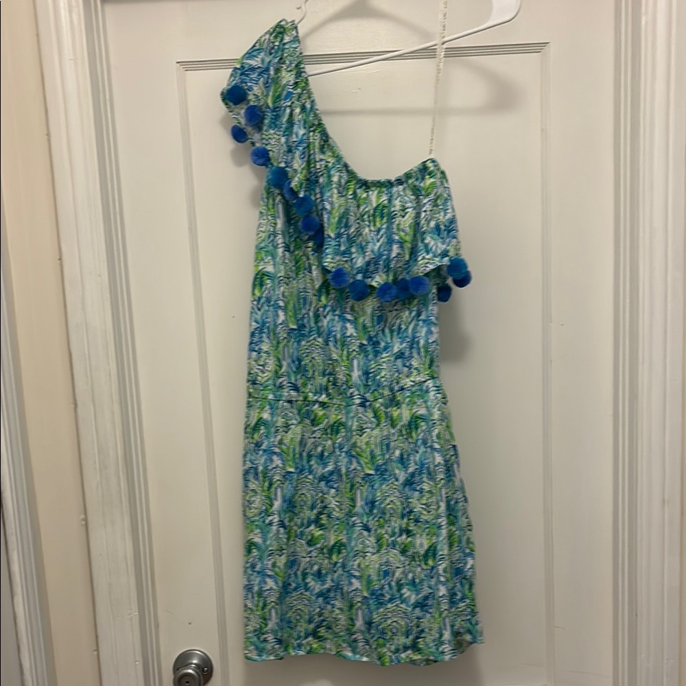Lilly Pulitzer Blue and Green Patterned one shoulder romper with Pom-Poms